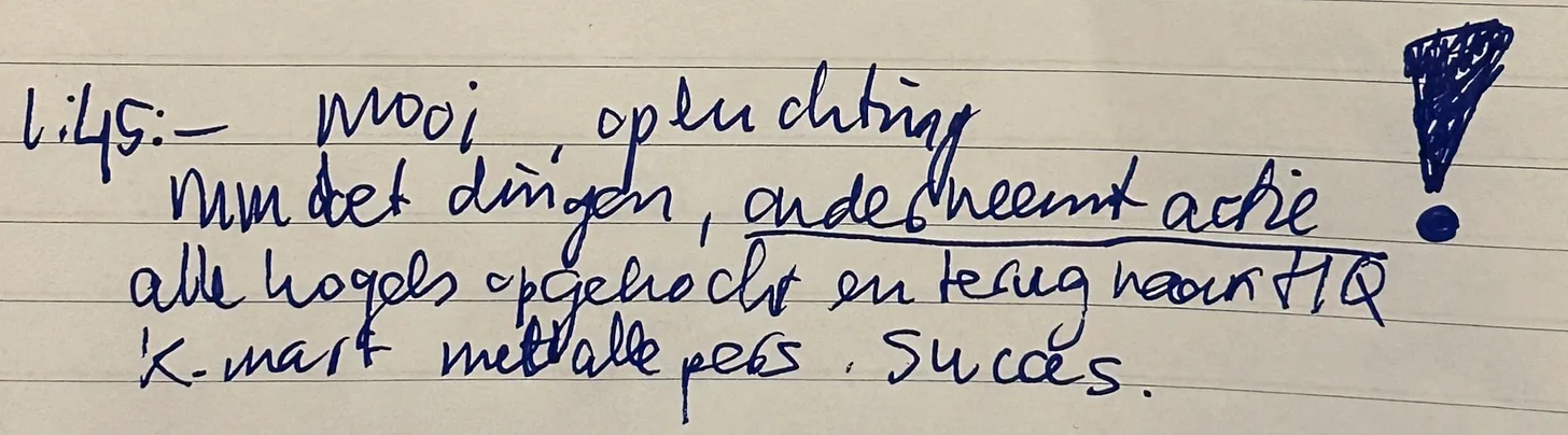Handwritten note: Relief regarding Michael Moore taking action at the K-mart headquarters